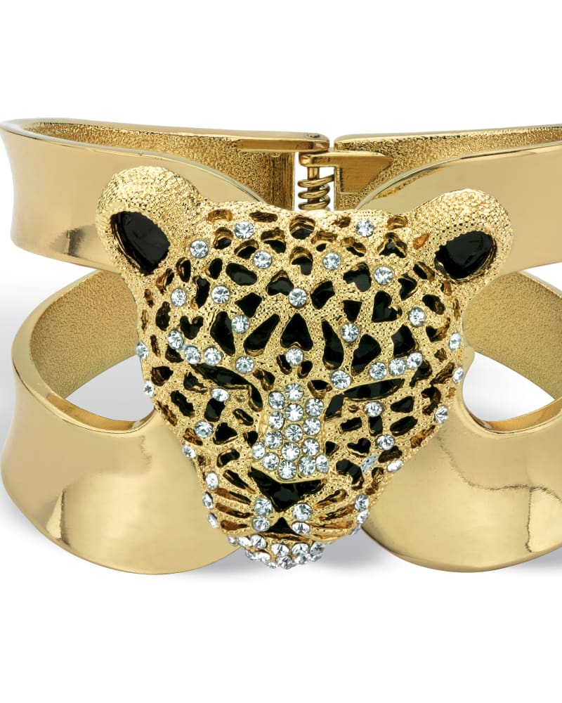 Front of a size 8 in Goldtone Crystal Leopard Hinged Cuff Bangle Bracelet (50mm) in White by PalmBeach Jewelry. | dia_product_style_image_id:333026